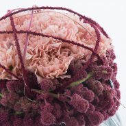Spherical Dianthus Amaranthus arrangement close-up