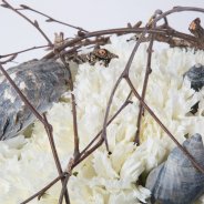Spherical funeral arrangement with Dianthus close-up