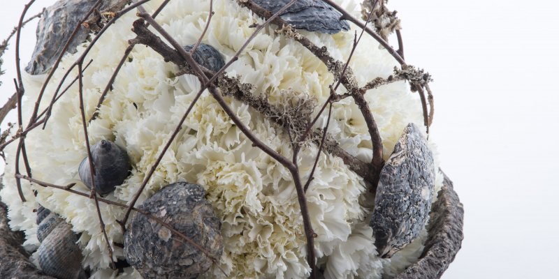 Spherical funeral arrangement with Dianthus