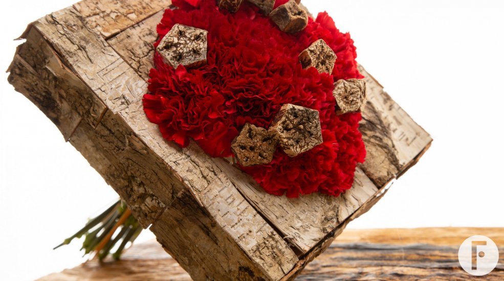 Mono bouquet with red carnations