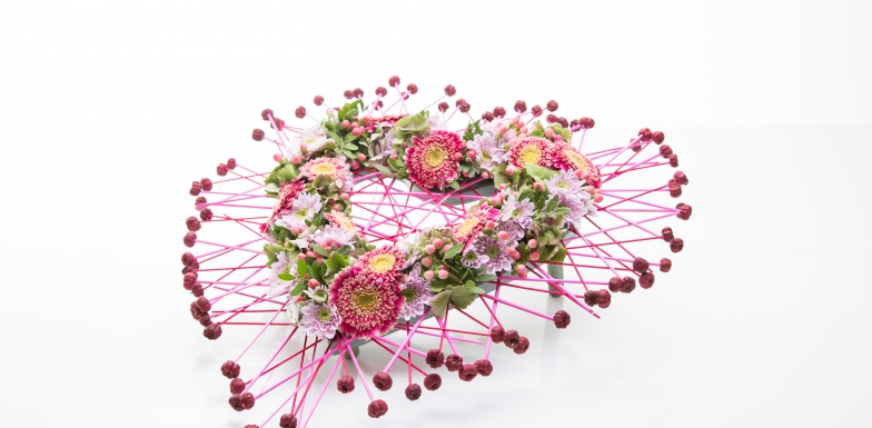 Passionate heart-shaped funeral flower arrangement