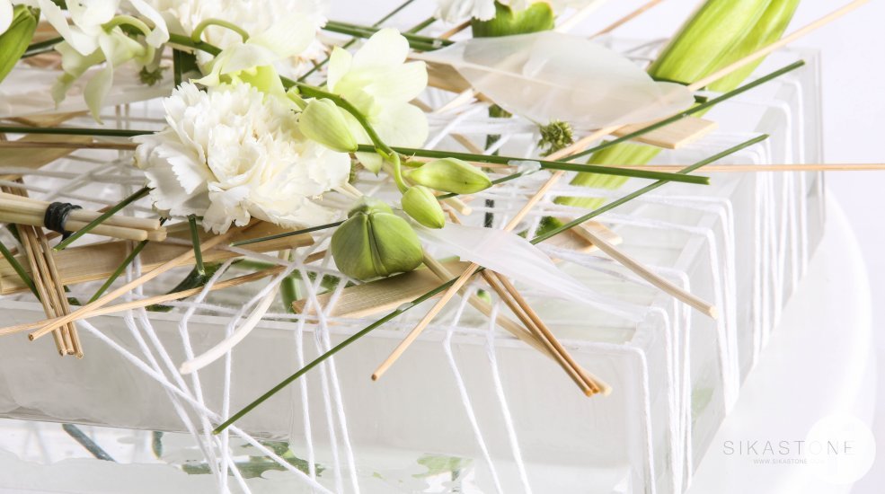 lilies cymbidiuma and dianthus design close by Pim van den Akker at Sikastone